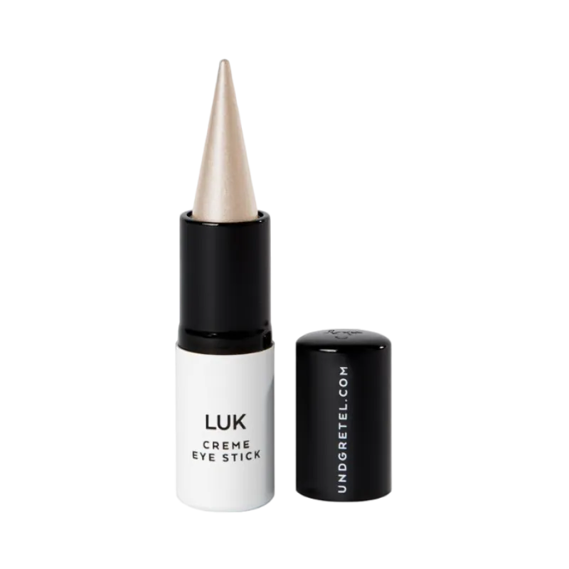 UND GRETEL LUK Creme Eye Stick in der Farbe Pearl, geöffnet mit abgenommenem Deckel.