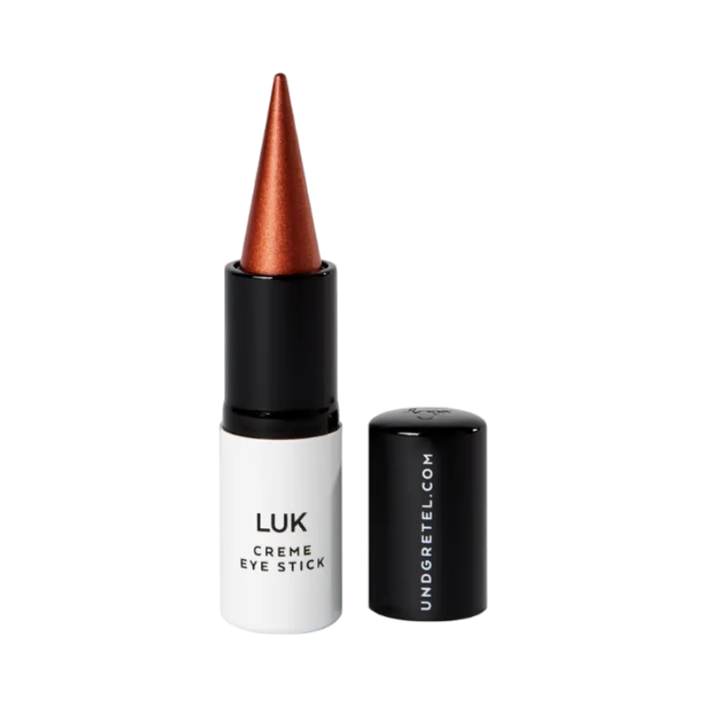 UND GRETEL LUK Creme Eye Stick in Bronze, geöffnete Verpackung mit abgenommenem Deckel.