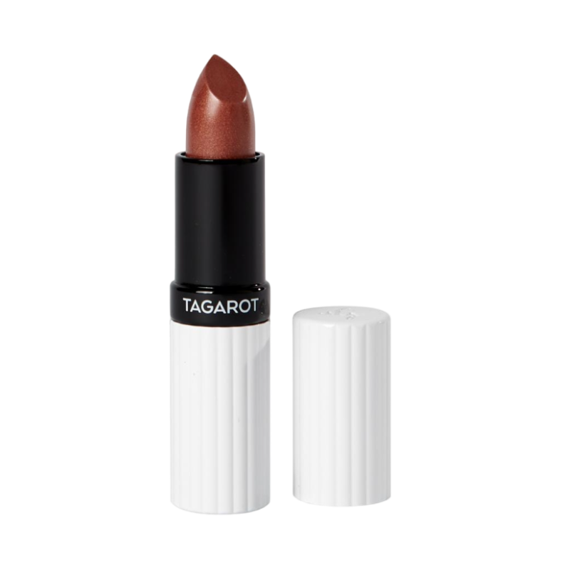 Ein geöffneter Lippenstift in Kupferfarbe von UND GRETEL, Modell TAGAROT, mit weißer Hülle.