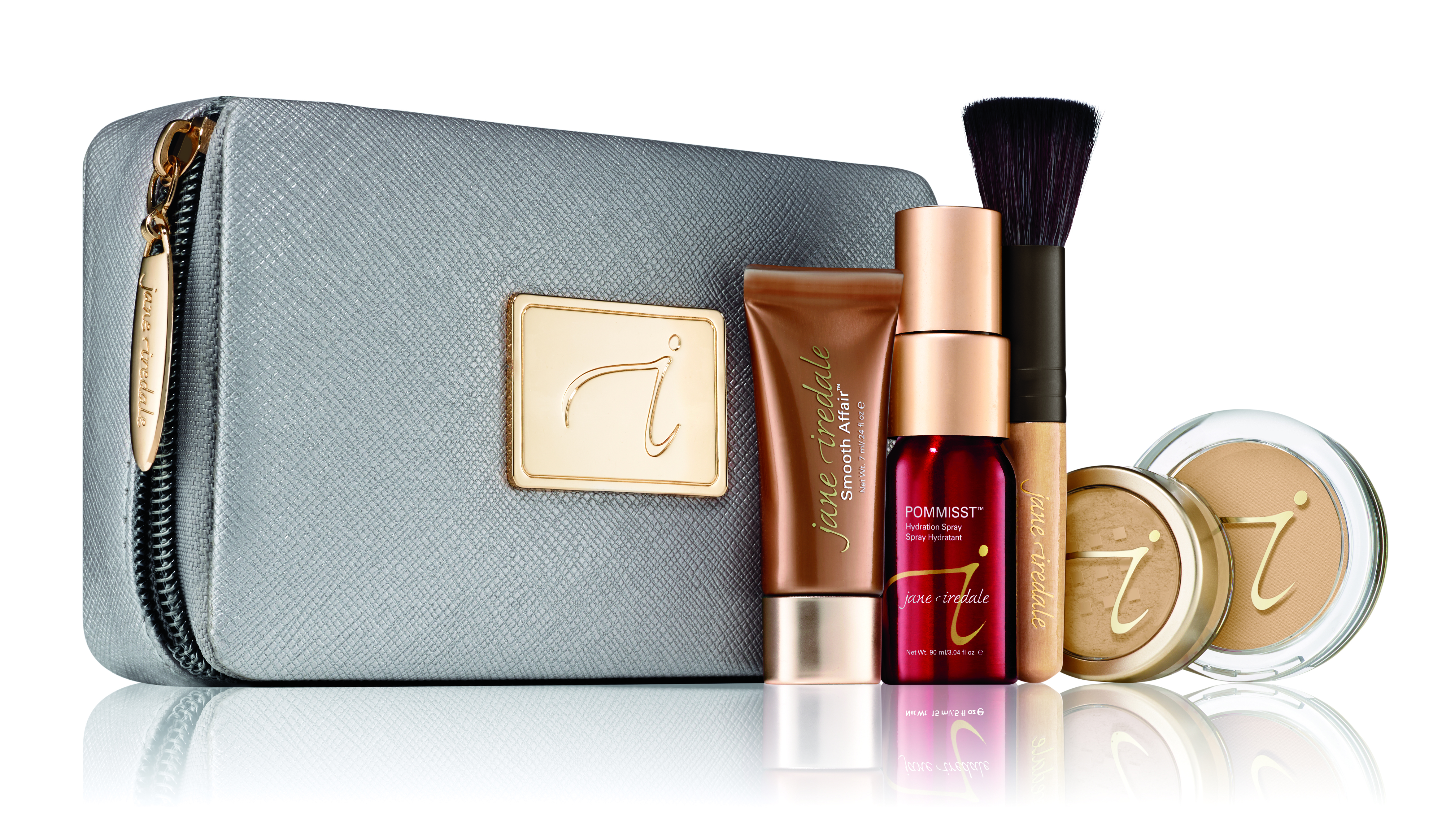 Jane Iredale Starter Kit Medium Dark: Kosmetiktasche, Foundation, Puder, Pinsel, Feuchtigkeitsspray und Concealer.