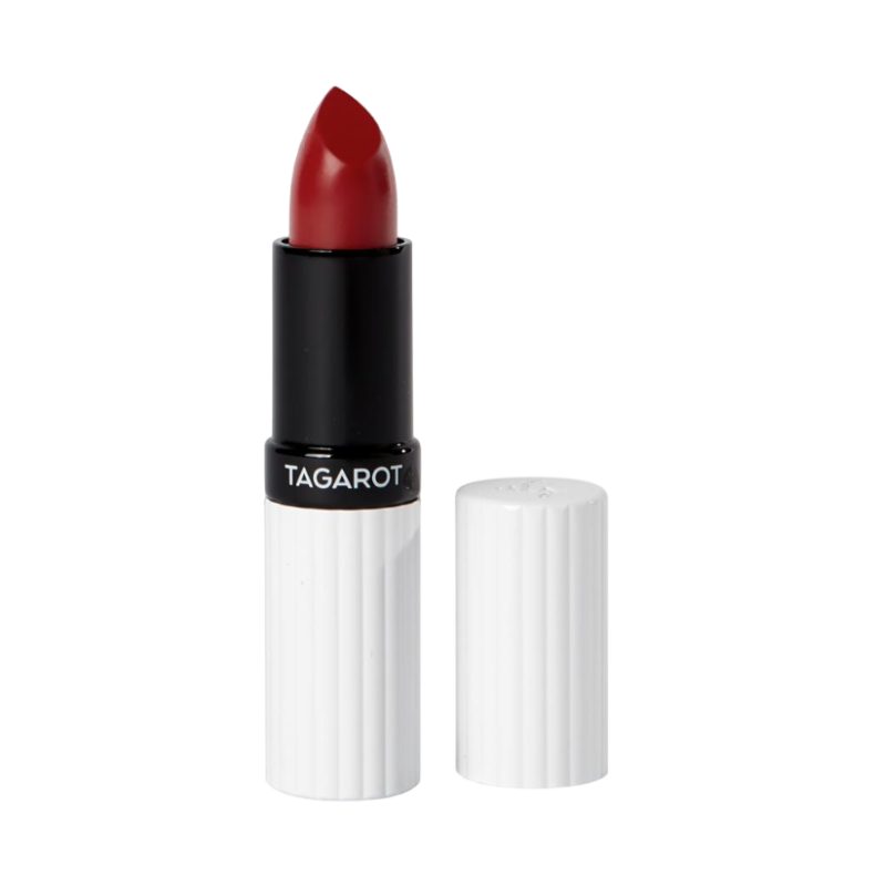 Ein geöffneter roter Lippenstift der Marke UND GRETEL, Modell TAGAROT, Farbton 3 Dahlia, mit weißer Kappe daneben.