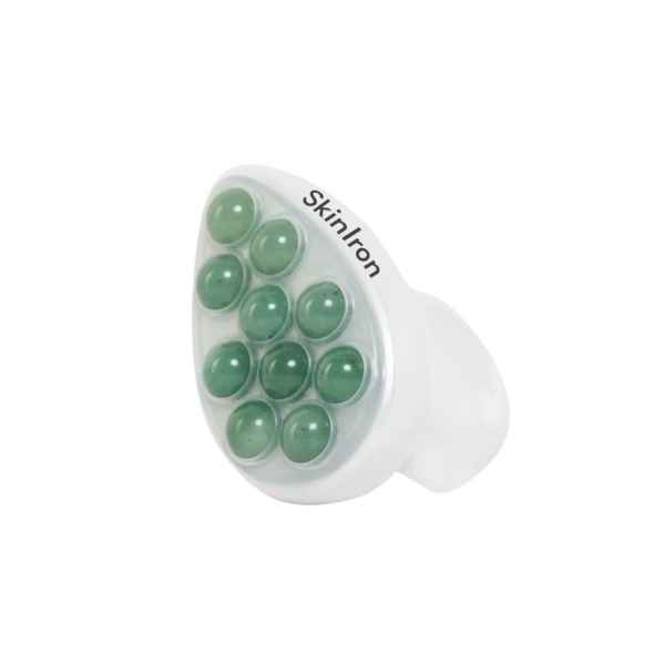 Handheld Hautmassagegerät 'SkinIron' mit grünen Massagekugeln.